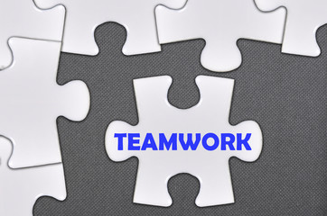 jigsaw puzzle written word teamwork