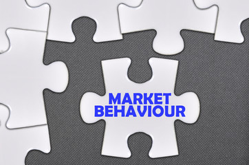 Fototapeta premium jigsaw puzzle written word market behaviour