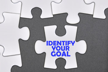 jigsaw puzzle written word identify your goal
