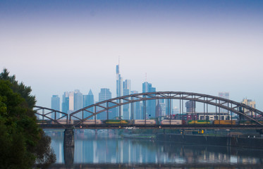Railway bridge and the skyline of  Frankfurt, Germany