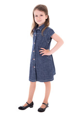 cute little girl in denim dress isolated on white