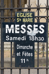 Fototapeta premium Mass times at the Eglise Sainte-Marie de La Bastide, Bordeaux, France