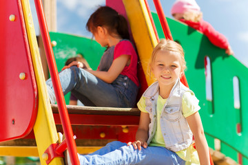Fototapeta na wymiar happy kids on children playground