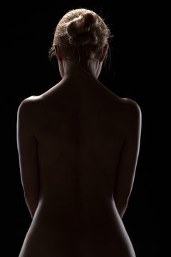 Art nude picture of naked blonde in the studio