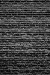 Fototapeta na wymiar Monochrome brick wall texture, background