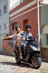 Obraz na płótnie Canvas couple on a scooter