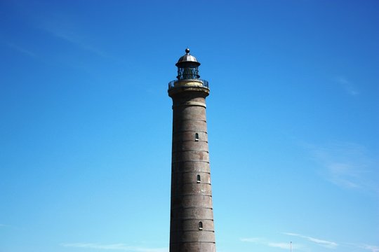 Skagen Lighthouse under blue sky, Denmark