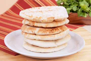 Pita Bread – A stack of 6 pieces of pita bread.