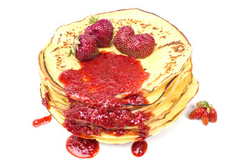 stack of pancakes with strawberries and jam