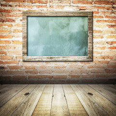 Picture frame on old empty room with concrete wall background vi