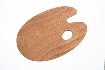 Wooden art palette on white background