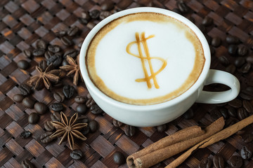 Latte art, coffee with coffee beans on wooden  background