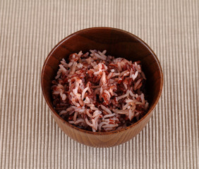 Red rice in a small ceramic dish