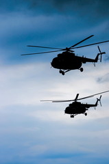 two transport helicopters