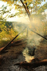 Cooking eat in bowler on the fire. Summer time 