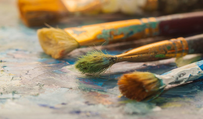 Obraz premium Paints brushes and oil paints