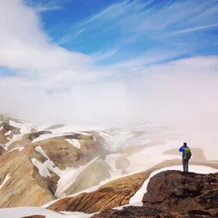 Zelfklevend Fotobehang hiker on top of the mountain in Iceland © Song_about_summer