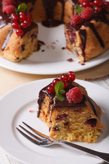 Slice of berry pie with chocolate close-up. vertical
