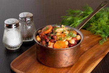 chili with beans, peas and chicken, close up