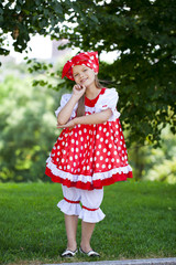 Portrait of a charming little girl looking at camera