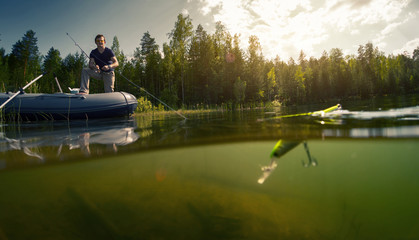 Obraz premium Fisherman on the pond