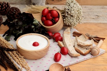 White yogurt and fresh cherry tomatoes