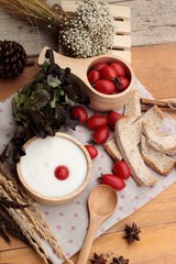 White yogurt and fresh cherry tomatoes