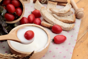 White yogurt and fresh cherry tomatoes