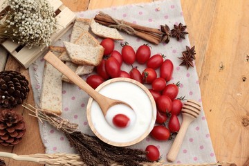 White yogurt and fresh cherry tomatoes
