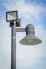 Lamp post against blue sky