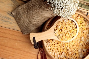 Soya beans on wood background