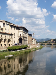 Fototapeta na wymiar View of Arno River from the Ponte Vecchio, Florence, Italy