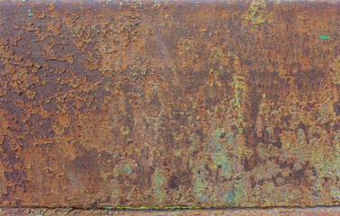 Rusty metal with traces of paint. Backgrounds and textures