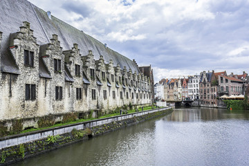 Obraz premium View of picturesque houses along channel in Ghent. Belgium.