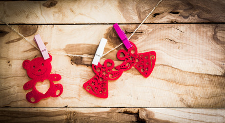 Valentine's Day wallpaper - Teddy Bear hanging with textile hearts