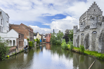 View of picturesque houses along channel in Ghent. Belgium.