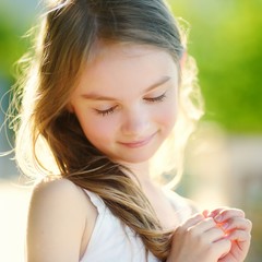 Fototapeta premium Adorable little girl on summer day