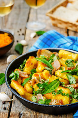 potatoes pumpkin gnocchi with bacon, cilantro and mint