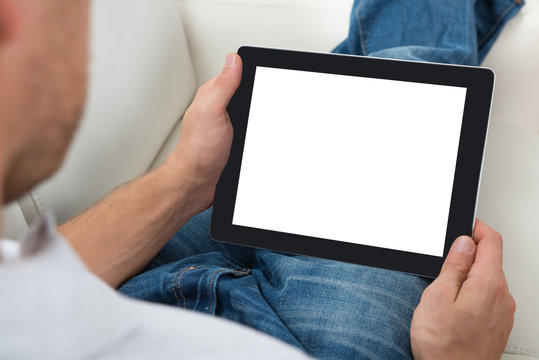 Person Holding Digital Tablet