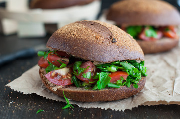 Italian tomato bruschetta with chopped vegetables, herbs and oil