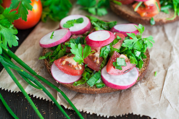 Italian tomato bruschetta with chopped vegetables, herbs and oil