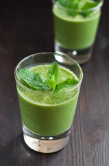 fresh homemade smoothie with spinach and bananas