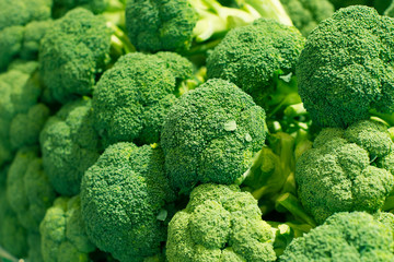 Stacked Broccolis in Grocery Store