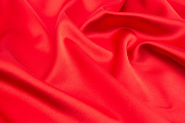 red satin or silk fabric as background