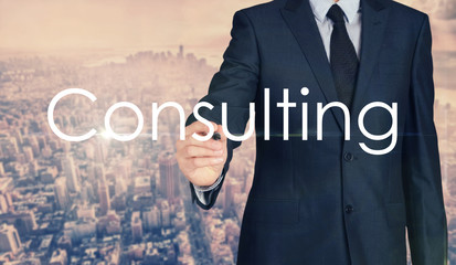 Businessman sketching and writing Consulting with nice business city background in retro colors.