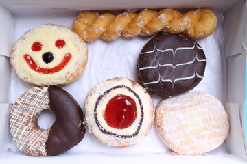 Assorted Colorful Donuts in Box