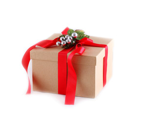 Brown paper gift box with red ribbon bow, isolated on white