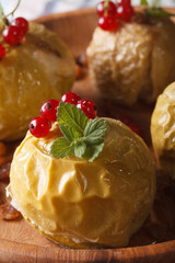 baked apple with fresh red currants and mint macro vertical
