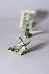 origami crane from a money note
