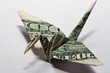 origami crane from a money note